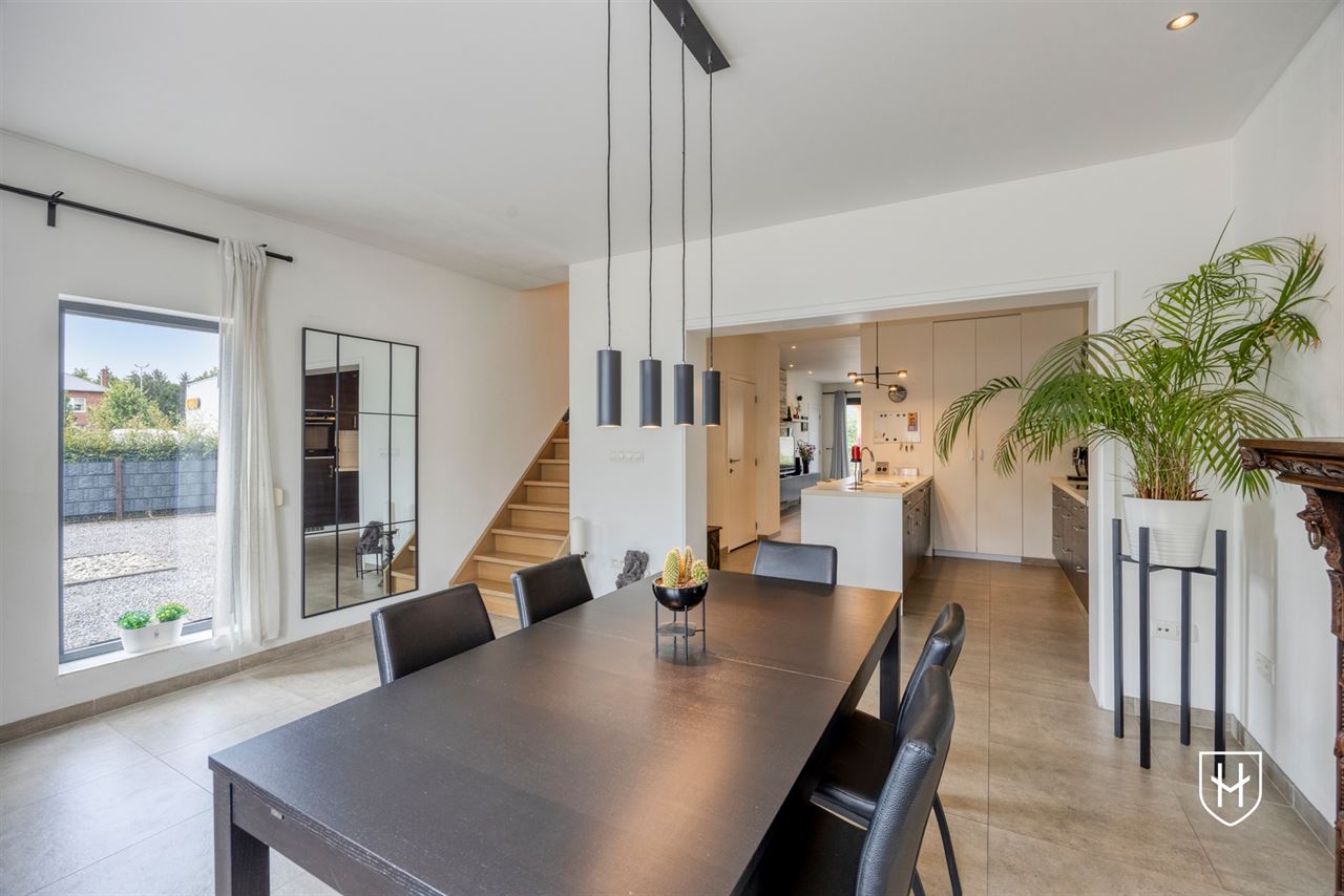 A modern, move-in-ready family home with a garage, carport, and sunny garden in the popular Lanaken-Rekem neighborhood