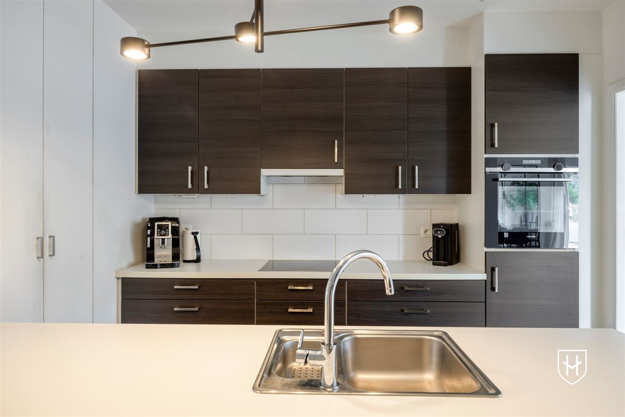 A modern, move-in-ready family home with a garage, carport, and sunny garden in the popular Lanaken-Rekem neighborhood