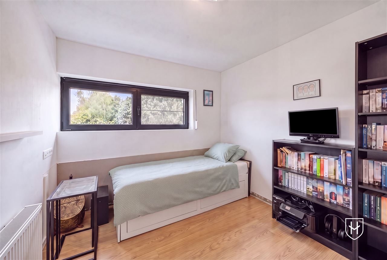 A modern, move-in-ready family home with a garage, carport, and sunny garden in the popular Lanaken-Rekem neighborhood