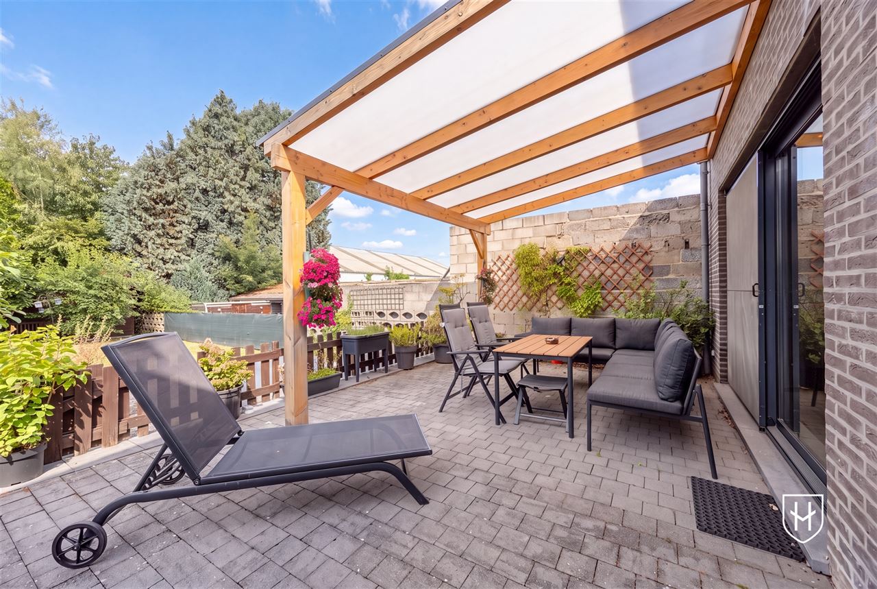 A modern, move-in-ready family home with a garage, carport, and sunny garden in the popular Lanaken-Rekem neighborhood