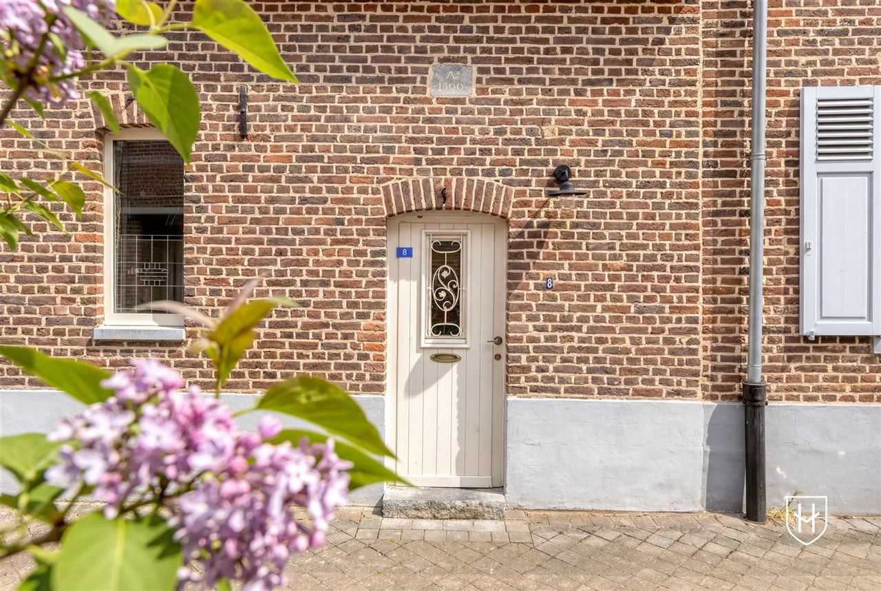 Bijzonder charmante woonbeleving bestaande uit twee woonentiteiten op een gegeerde locatie in het centrum van Oud-Rekem