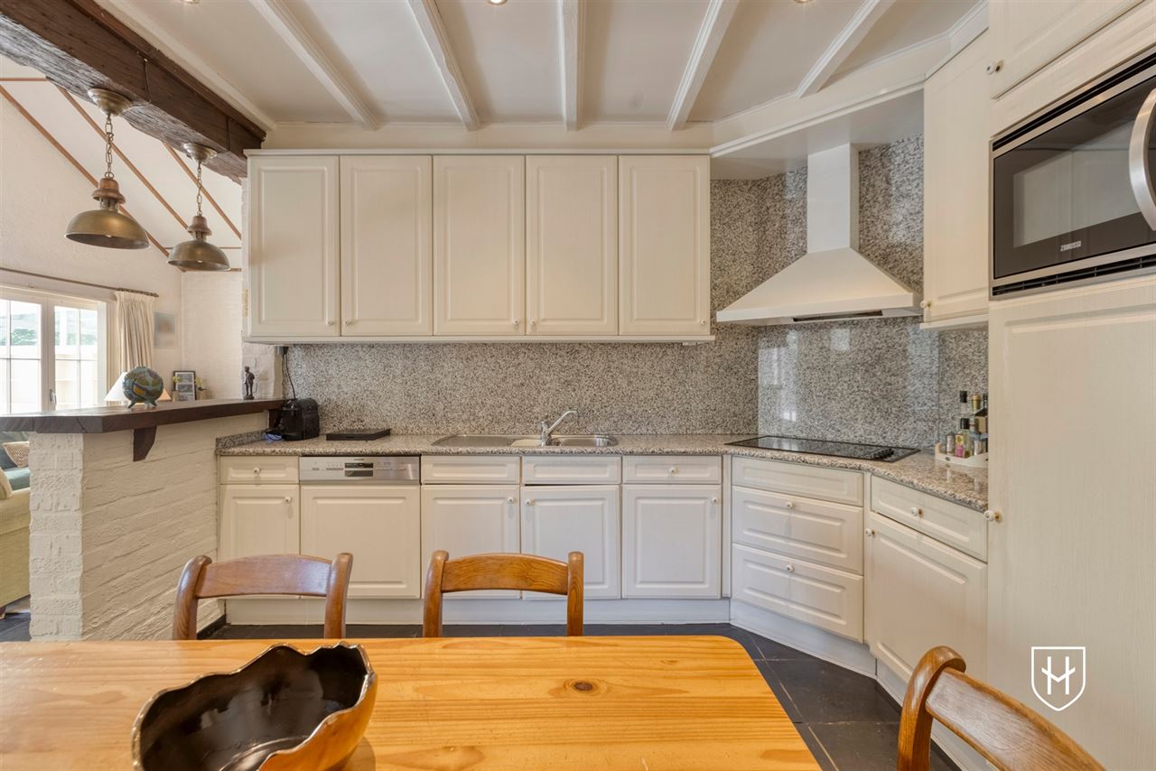 Spacious 4-bedroom bungalow on the edge of the woods in a sought-after prime location in the lush Zutendaal