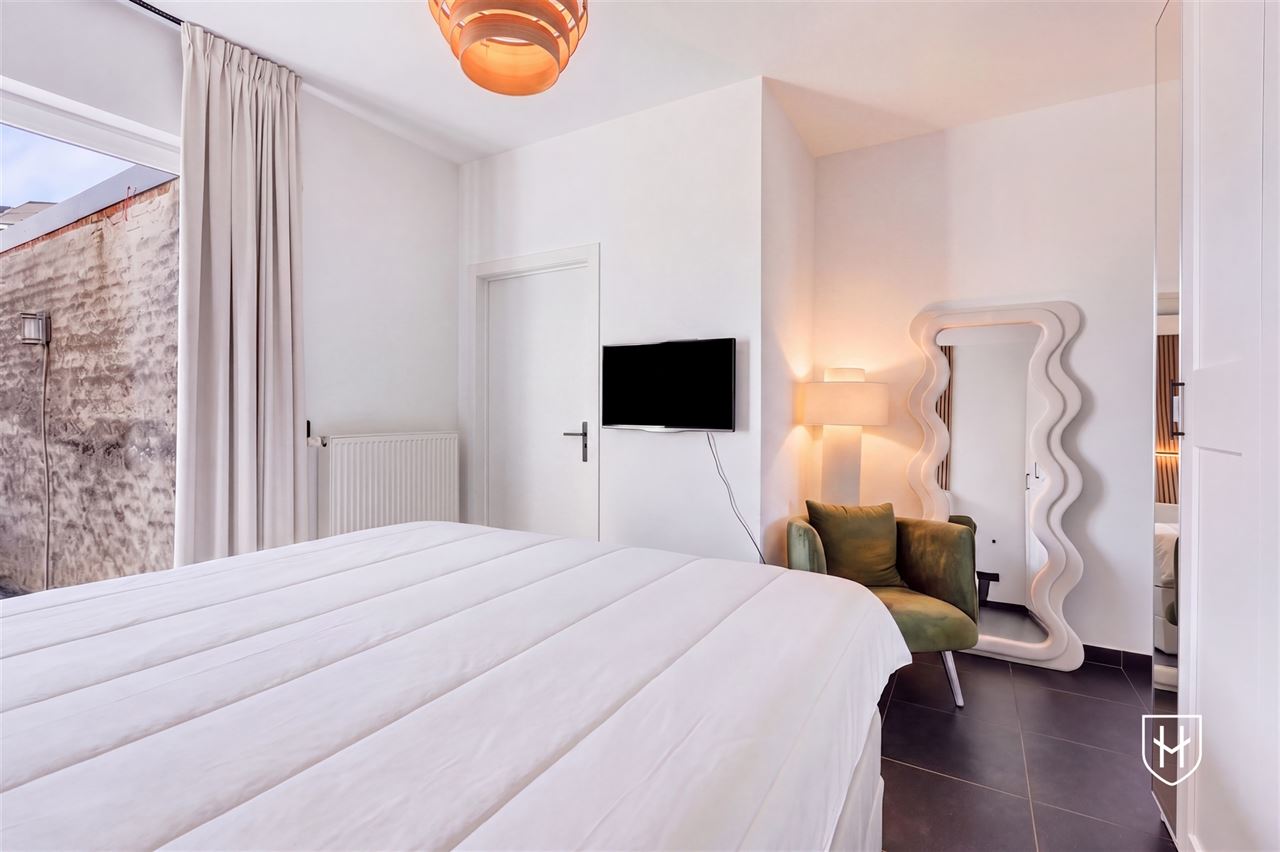 Instapklaar appartement met 2 slaapkamers, 2 badkamers en een grote garage, pal in het centrum van Lanaken