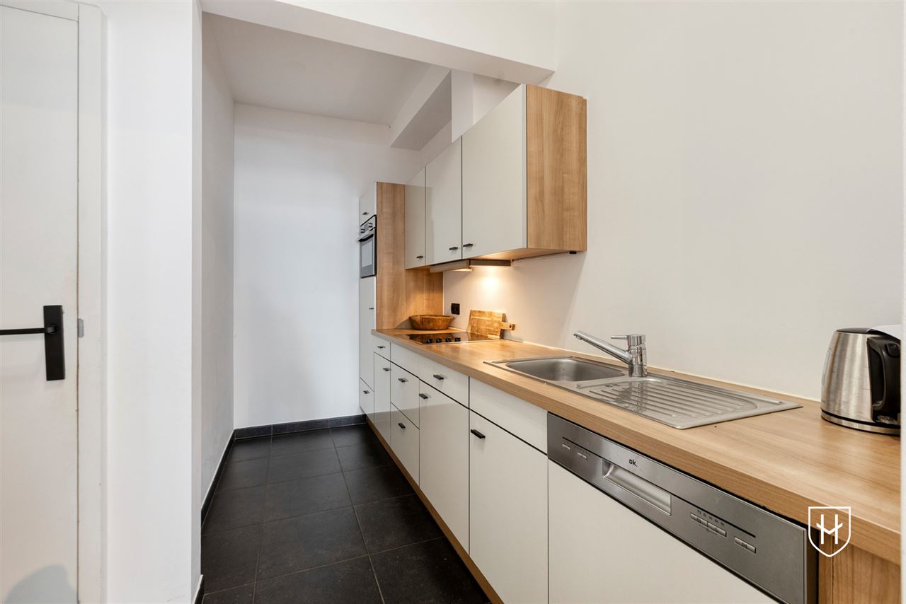 Instapklaar appartement met 2 slaapkamers, 2 badkamers en een grote garage, pal in het centrum van Lanaken