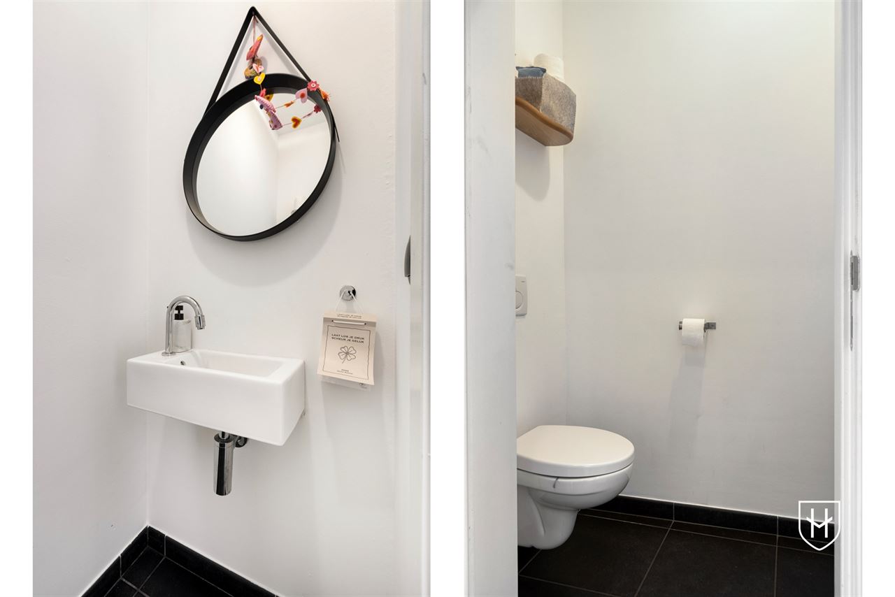 Instapklaar appartement met 2 slaapkamers, 2 badkamers en een grote garage, pal in het centrum van Lanaken
