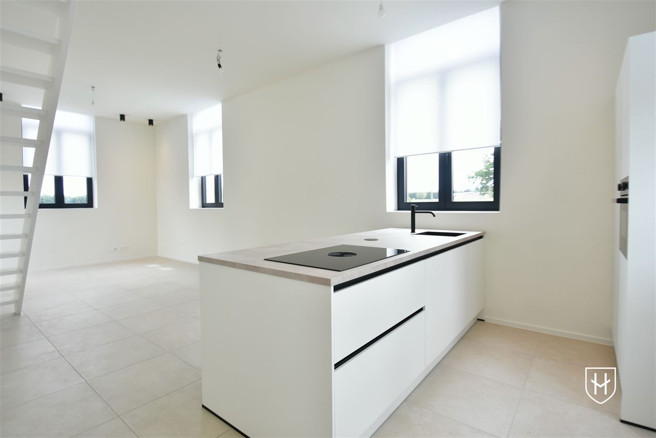 Luxe appartement met zonnepanelen, 3 slaapkamers en 2 badkamers, met eigen tuintje en terras, te Lanaken-Veldwezelt