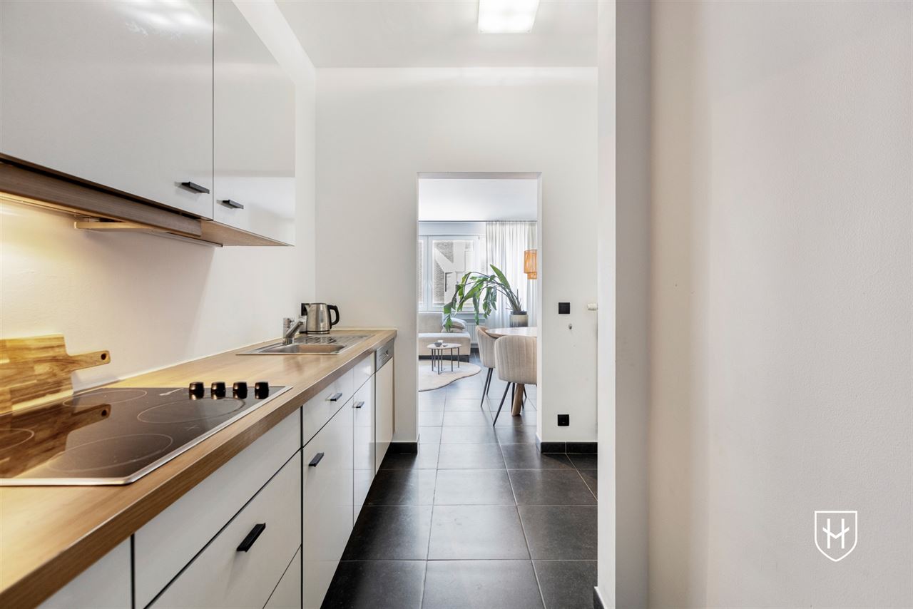 Instapklaar appartement met 2 slaapkamers, 2 badkamers en een grote garage, pal in het centrum van Lanaken