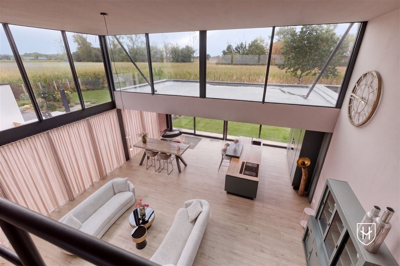 Architecturale loftwoning met hotel-chique interieur en vrij uitzicht op een uitstekende locatie aan de groene rand van Dilsen-Stokkem