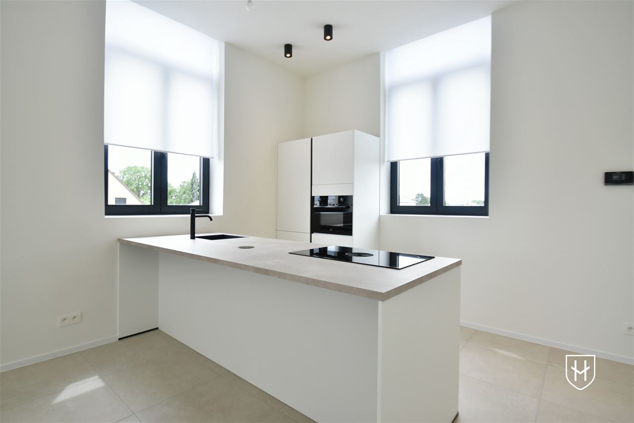 Luxe appartement met zonnepanelen, 3 slaapkamers en 2 badkamers, met eigen tuintje en terras, te Lanaken-Veldwezelt