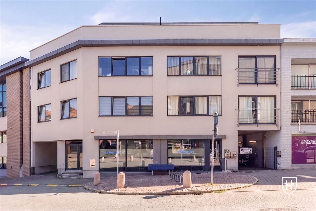 Instapklaar appartement met 2 slaapkamers, 2 badkamers en een grote garage, pal in het centrum van Lanaken