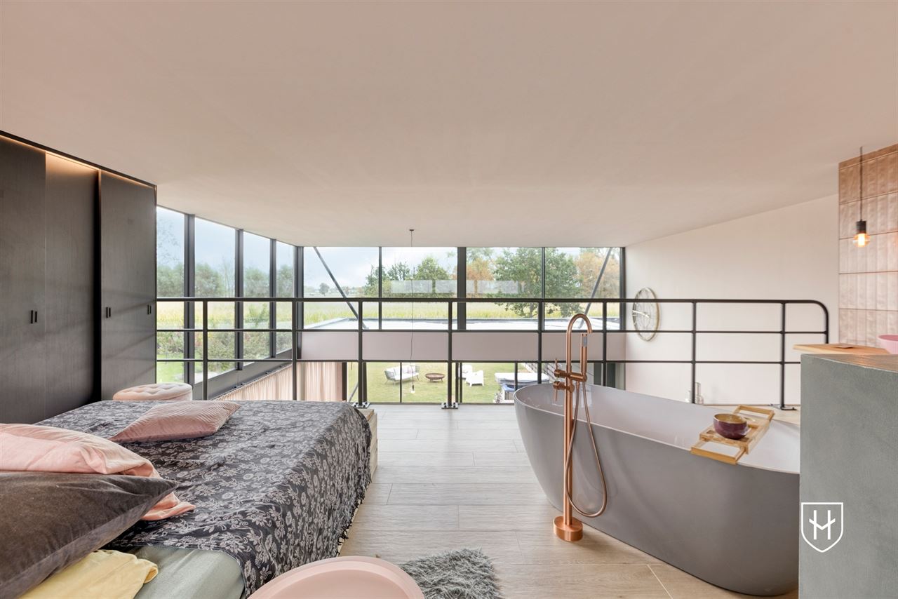 Architecturale loftwoning met hotel-chique interieur en vrij uitzicht op een uitstekende locatie aan de groene rand van Dilsen-Stokkem
