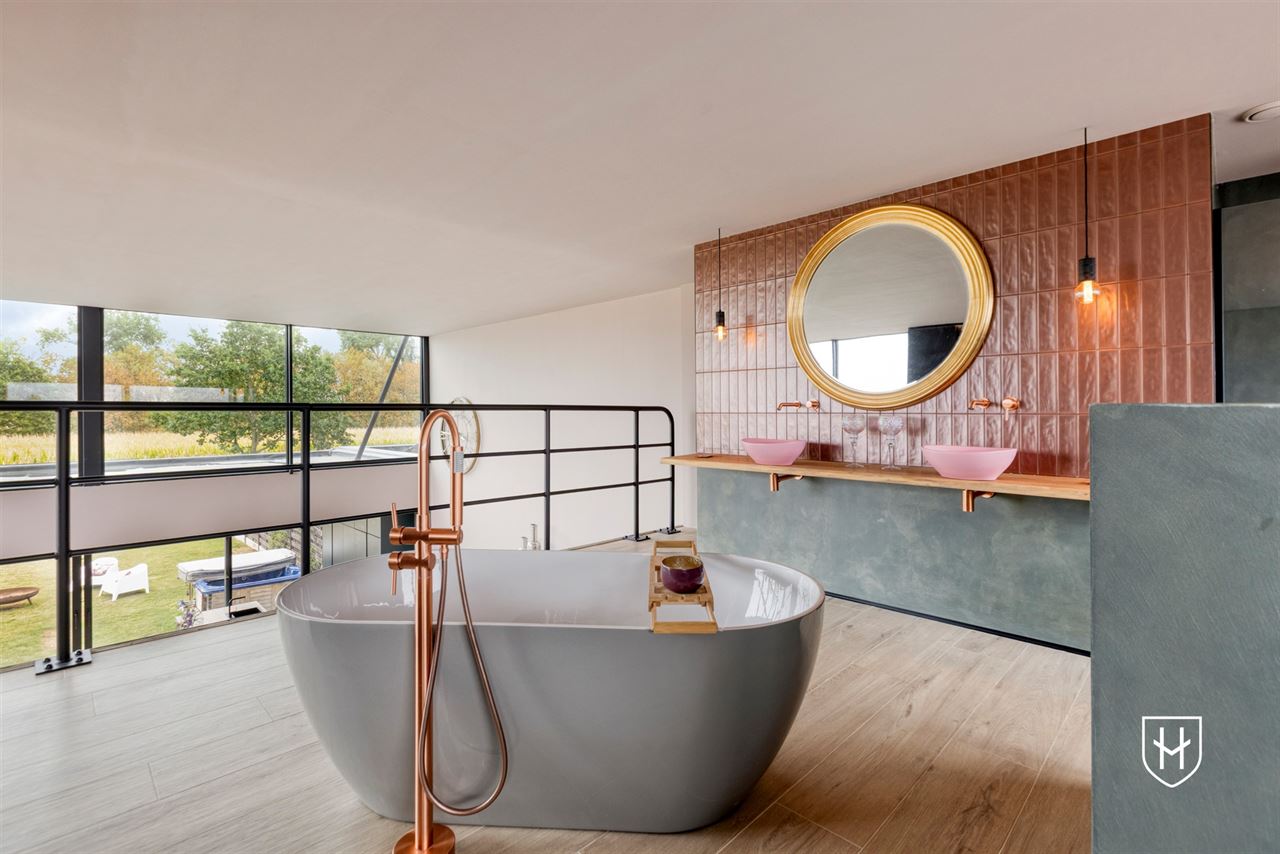 Architecturale loftwoning met hotel-chique interieur en vrij uitzicht op een uitstekende locatie aan de groene rand van Dilsen-Stokkem