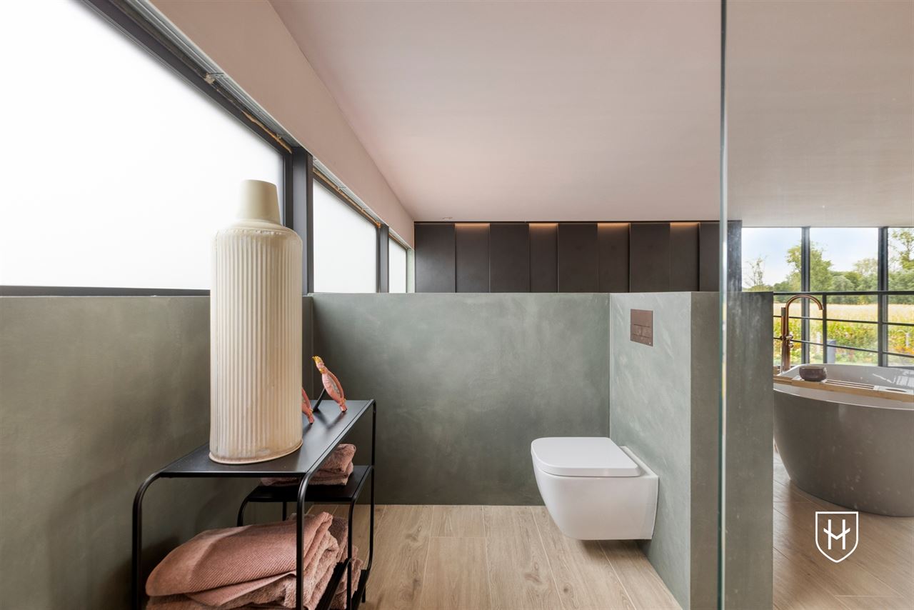 Architecturale loftwoning met hotel-chique interieur en vrij uitzicht op een uitstekende locatie aan de groene rand van Dilsen-Stokkem