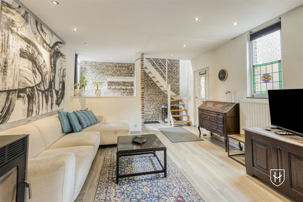 Particularly charming living experience consisting of two residential entities in a coveted location in the center of Oud-Rekem