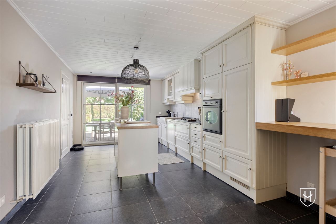 Perfect onderhouden en charmante cottage met 3 slaapkamers en prachtig aangelegde tuin in het centrum van Lommel