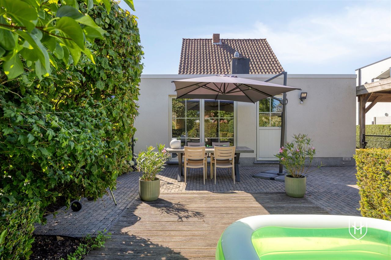 Perfect onderhouden en charmante cottage met 3 slaapkamers en prachtig aangelegde tuin in het centrum van Lommel