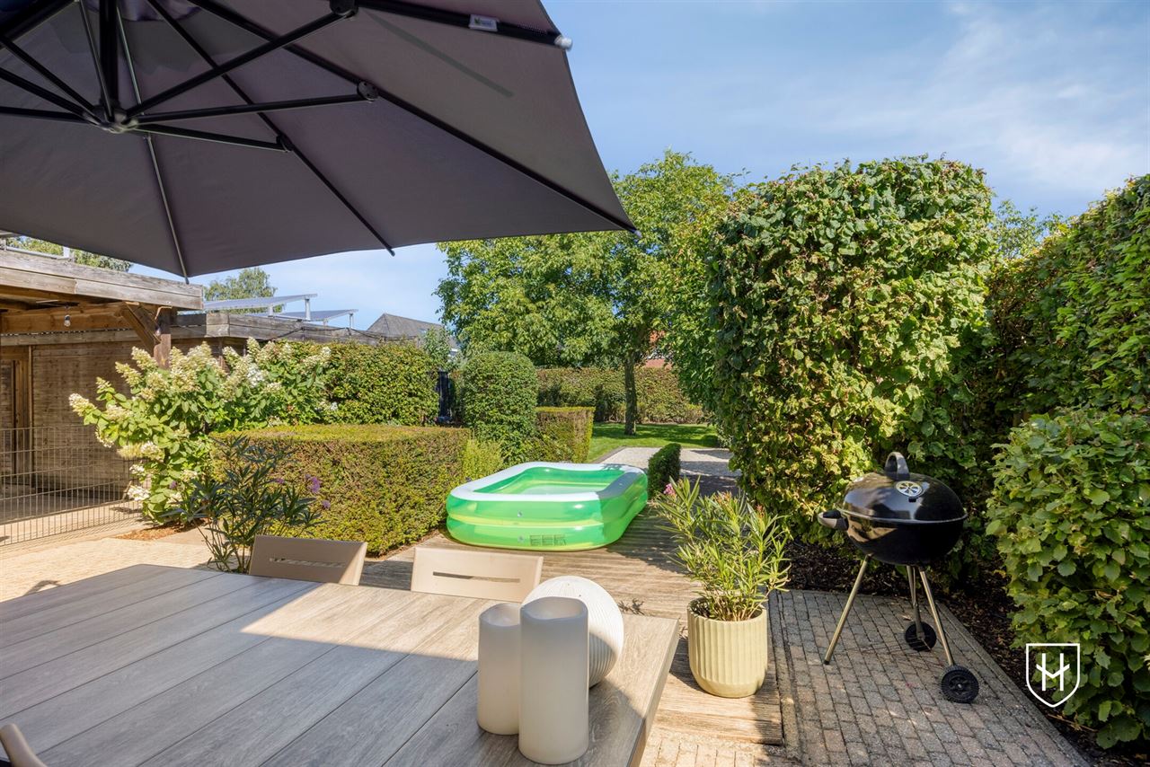 Perfect onderhouden en charmante cottage met 3 slaapkamers en prachtig aangelegde tuin in het centrum van Lommel