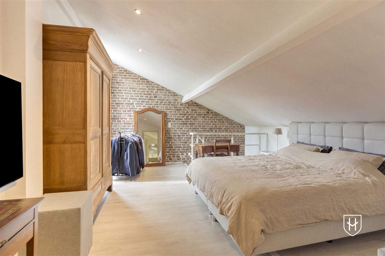 Particularly charming living experience consisting of two residential entities in a coveted location in the center of Oud-Rekem