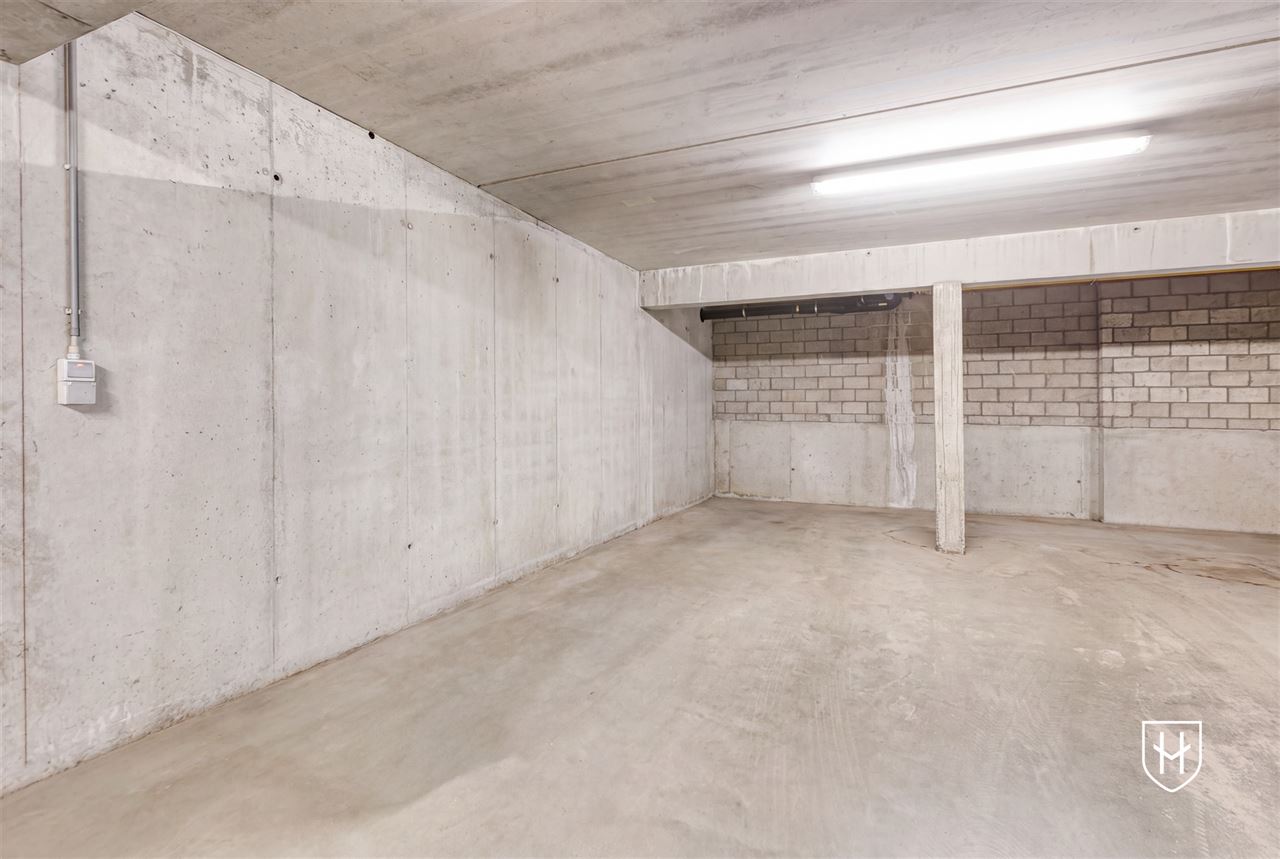 Smaakvol design-penthouse met autostandplaats en twee terrassen, mooi gelegen nabij het centrum van Lanaken