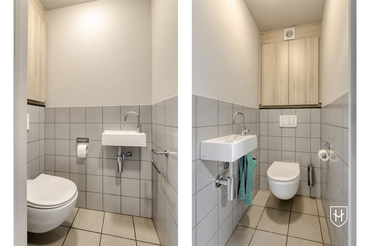 Immeuble de bureaux de caractère doté d'un grand parking privé, bénéficiant d'un emplacement extrêmement central à Maasmechelen