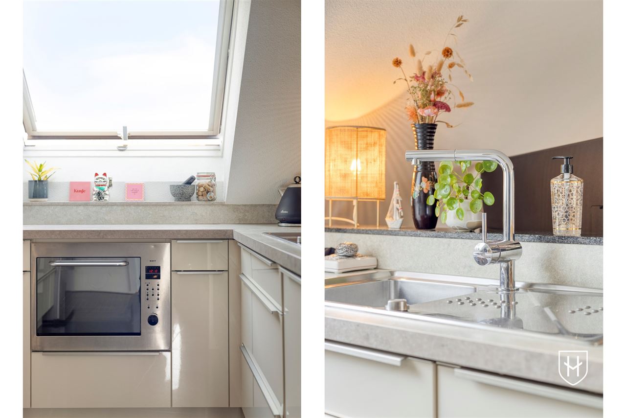 Smaakvol design-penthouse met autostandplaats en twee terrassen, mooi gelegen nabij het centrum van Lanaken