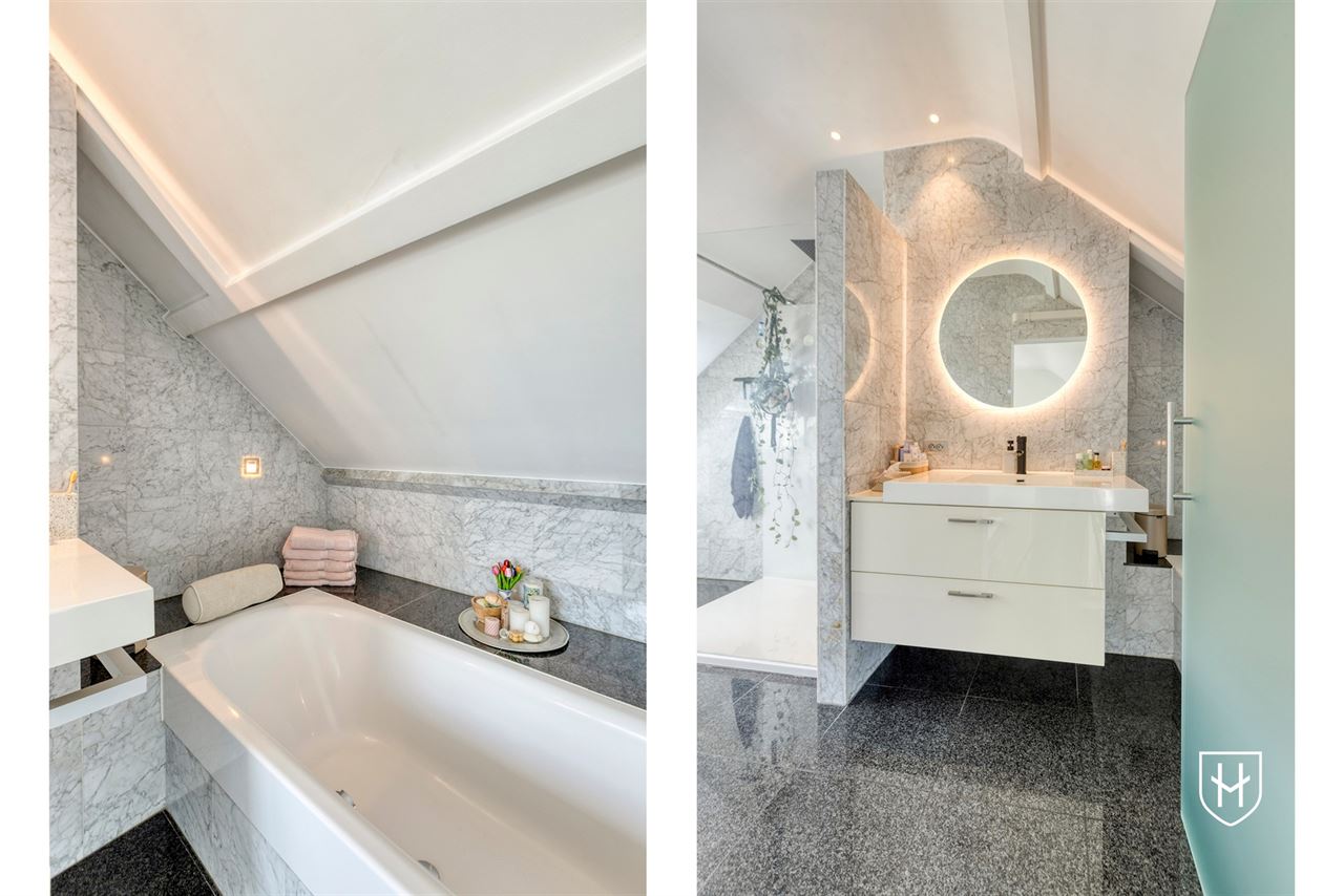 Smaakvol design-penthouse met autostandplaats en twee terrassen, mooi gelegen nabij het centrum van Lanaken