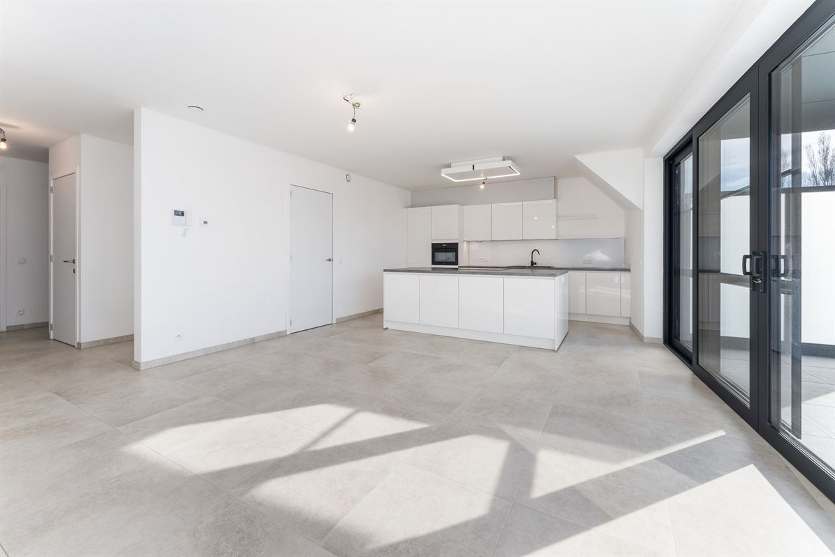 Ruim recent nieuwbouwappartement met terras aan de stadsrand - mog. tot aankoop van garagebox