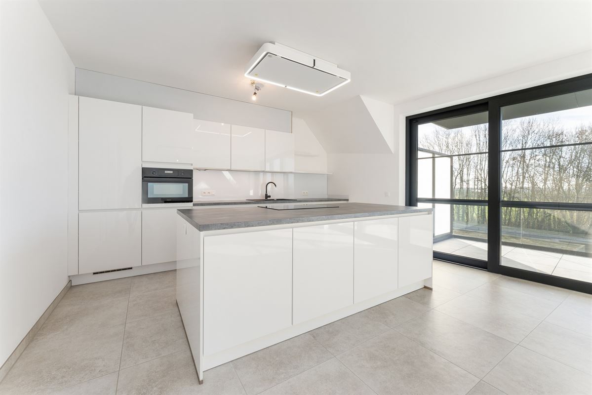 Ruim recent nieuwbouwappartement met terras aan de stadsrand - mog. tot aankoop van garagebox