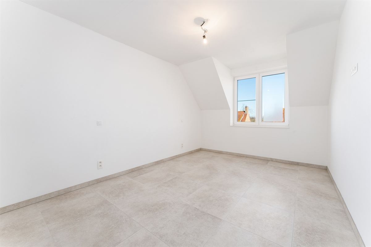 Ruim recent nieuwbouwappartement met terras aan de stadsrand - mog. tot aankoop van garagebox