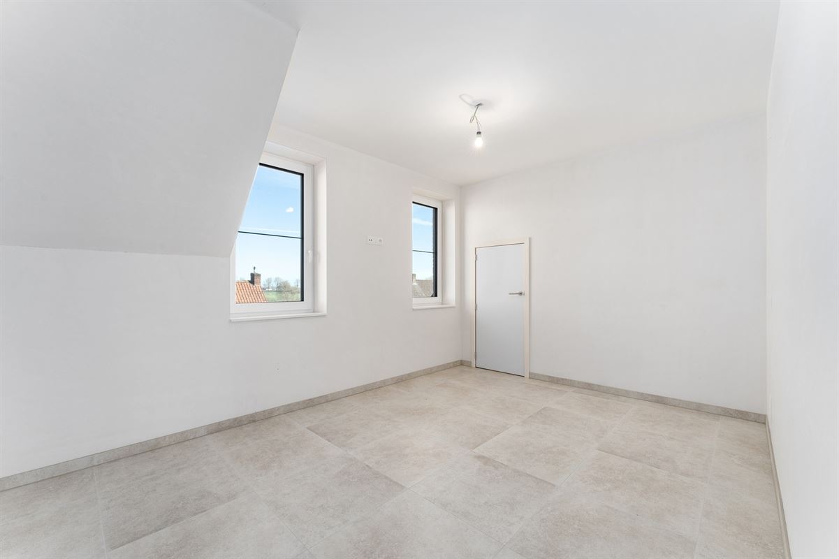 Ruim recent nieuwbouwappartement met terras aan de stadsrand - mog. tot aankoop van garagebox