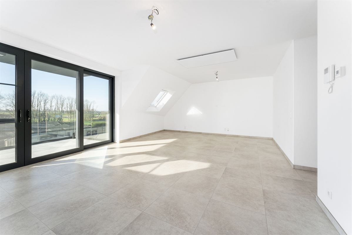 Ruim recent nieuwbouwappartement met terras aan de stadsrand - mog. tot aankoop van garagebox