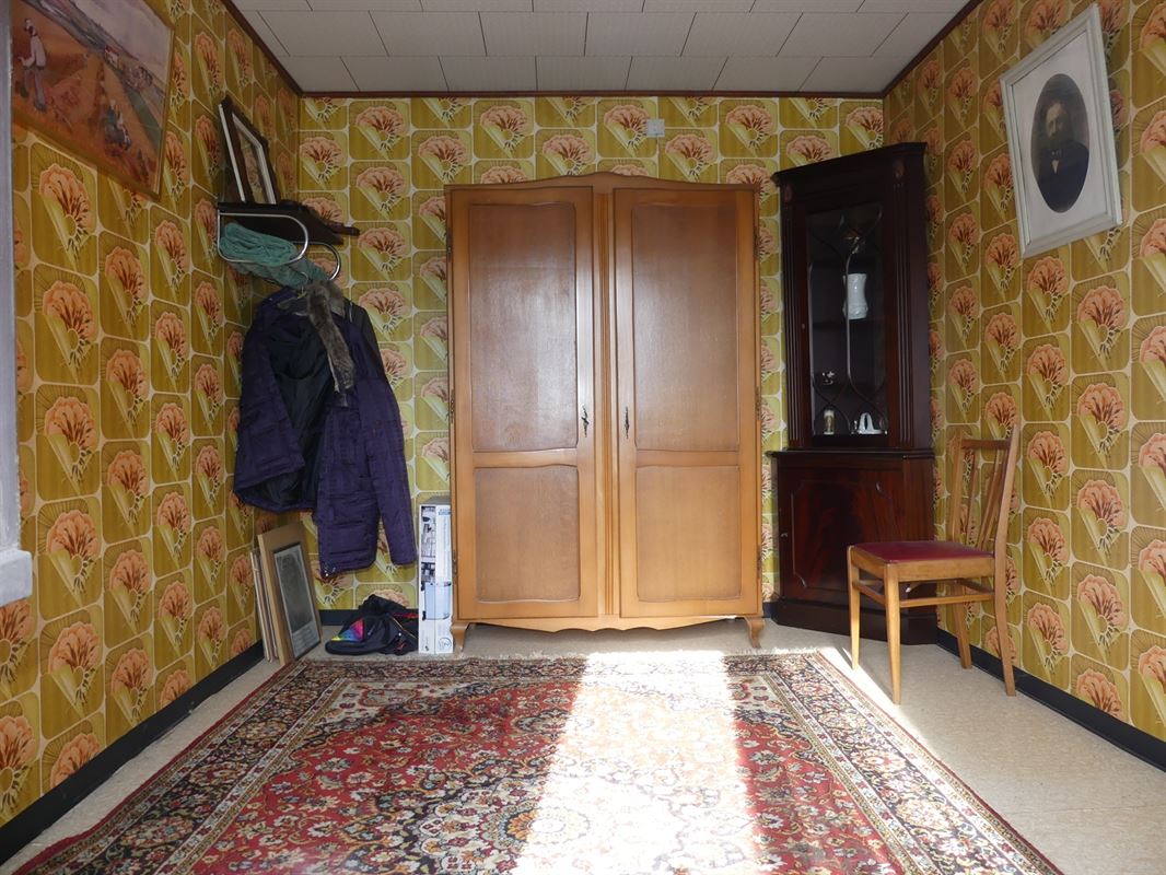 Te renoveren dorpswoning met tuintje en garage