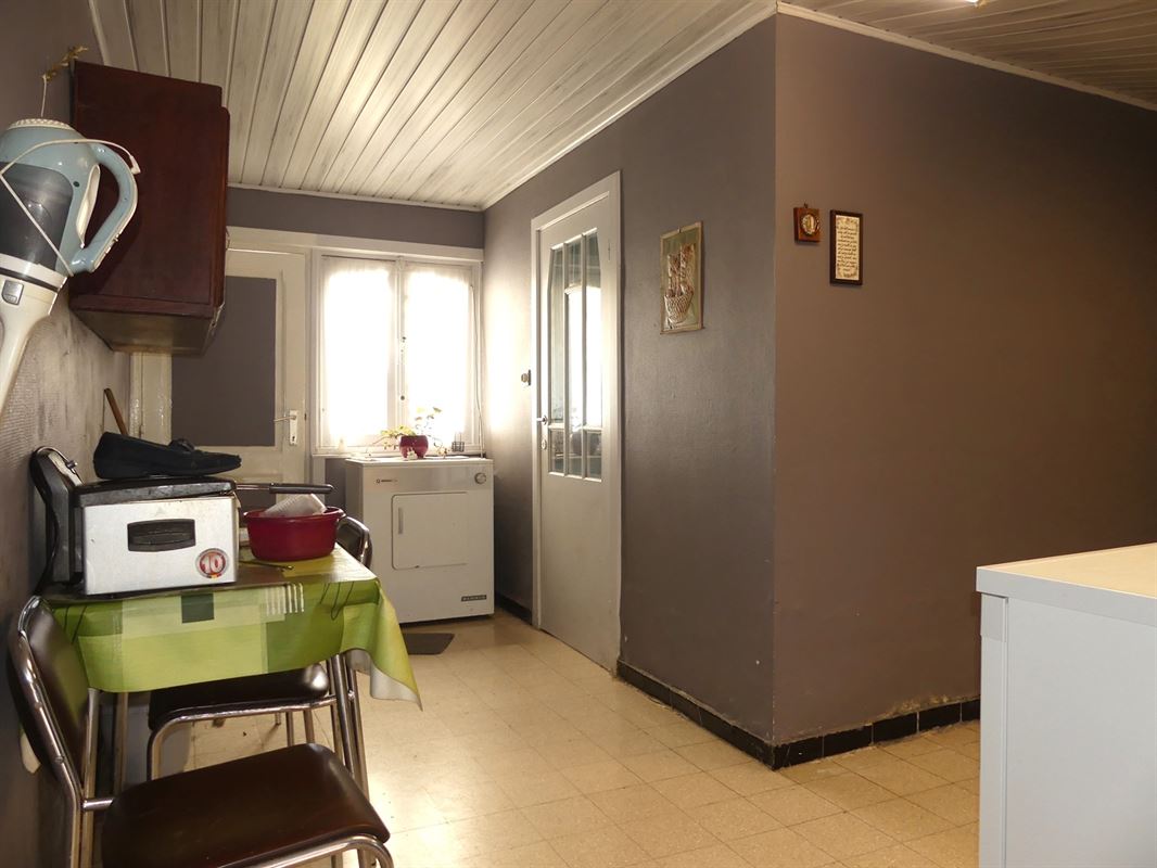 Te renoveren dorpswoning met tuintje en garage
