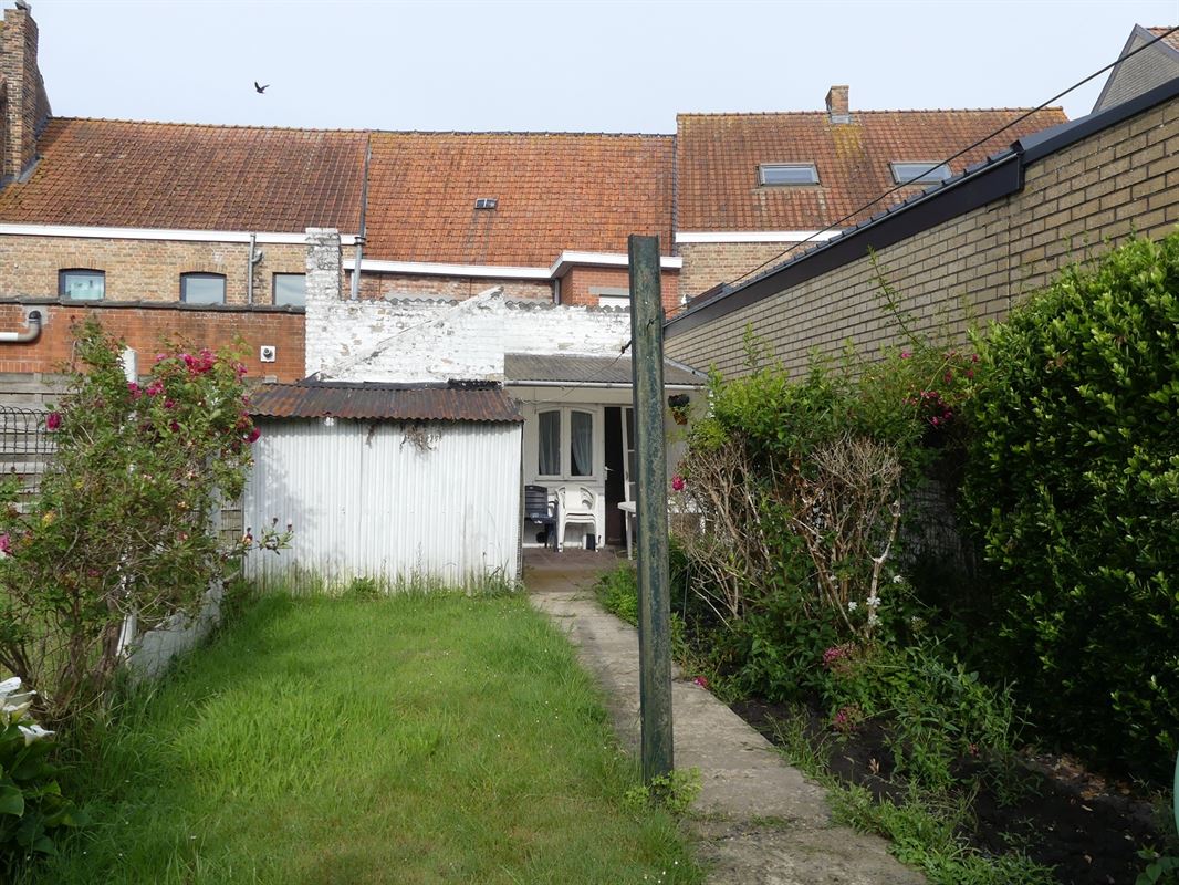 Te renoveren dorpswoning met tuintje en garage