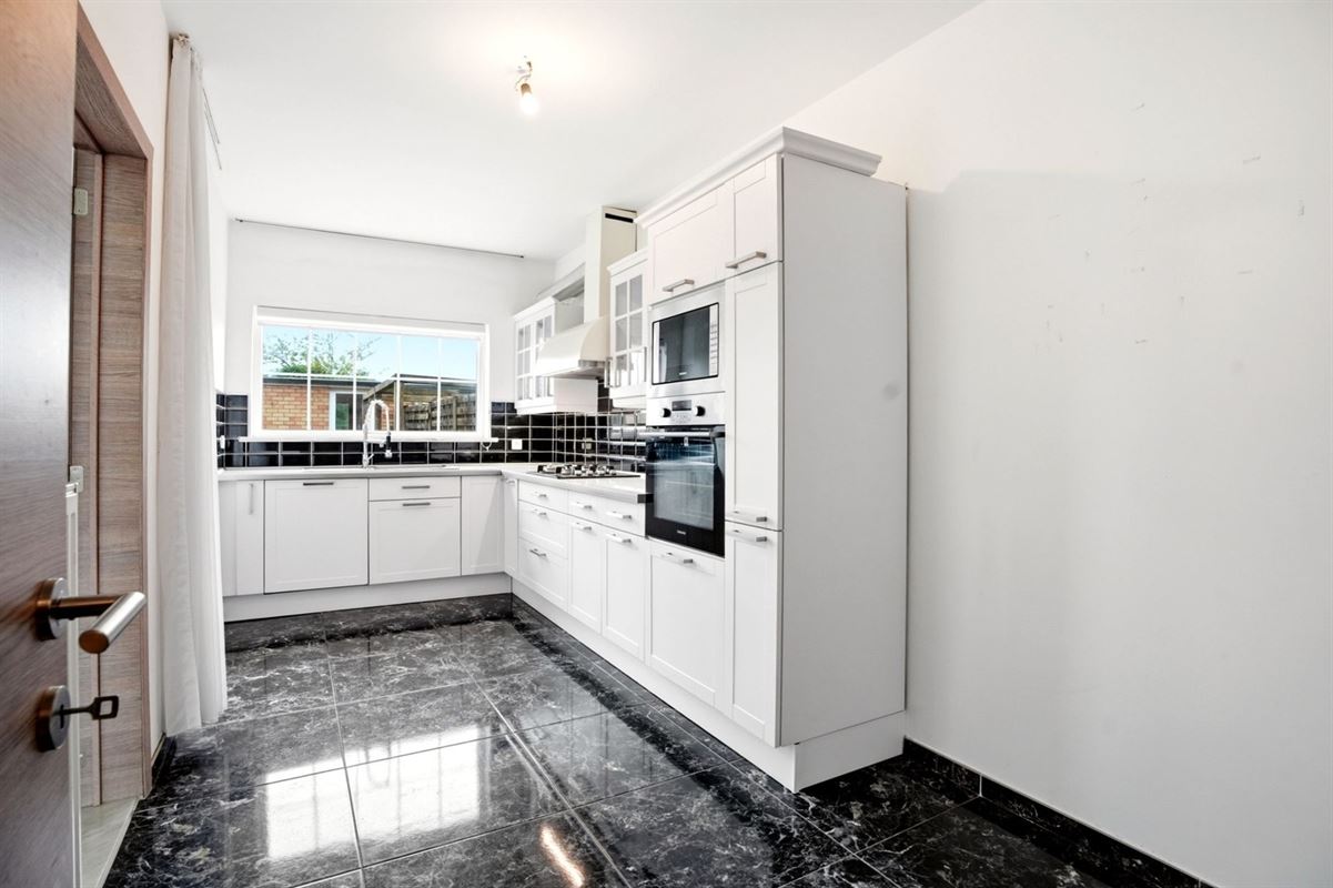 Gerenoveerde woning met garage en tuintje