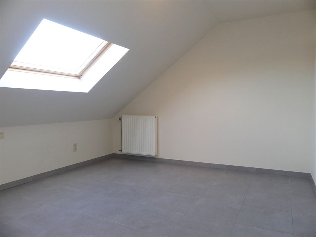 Instapklare woning met garage en tuintje in de woonkern van Beerst