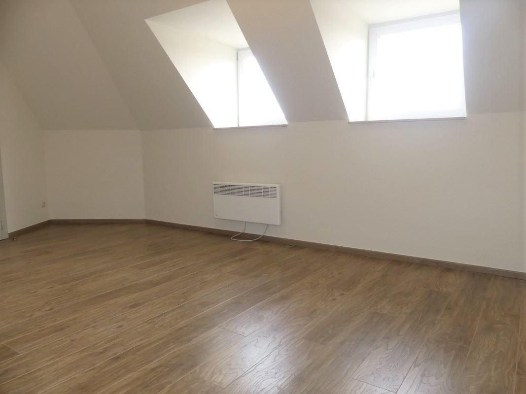 Ruim dakappartement met 2 slaapkamers en garage