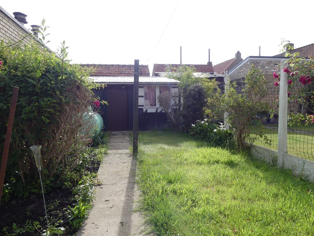 Te renoveren dorpswoning met tuintje en garage