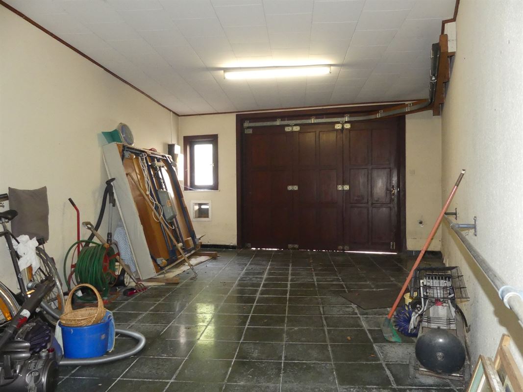 Te renoveren dorpswoning met tuintje en garage