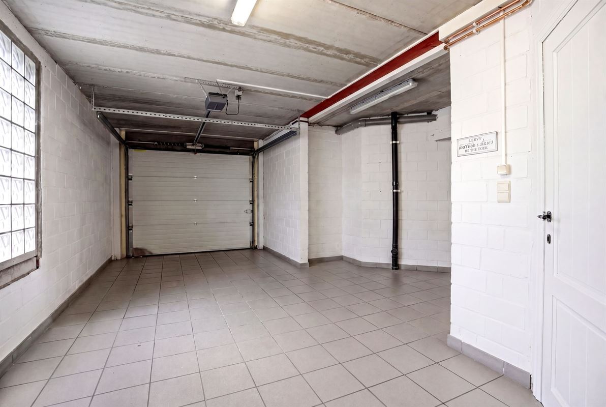 Instapklare gezinswoning met 3 slaapkamers, garage en zonnige tuin in een rustige verkaveling