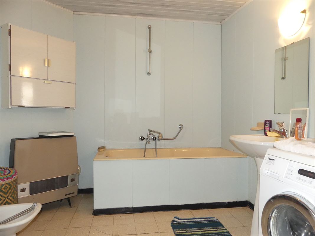 Te renoveren dorpswoning met tuintje en garage