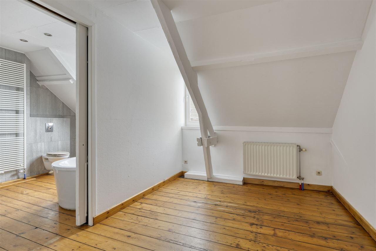 Herenwoning ingedeeld in 2 duplexappartementen
