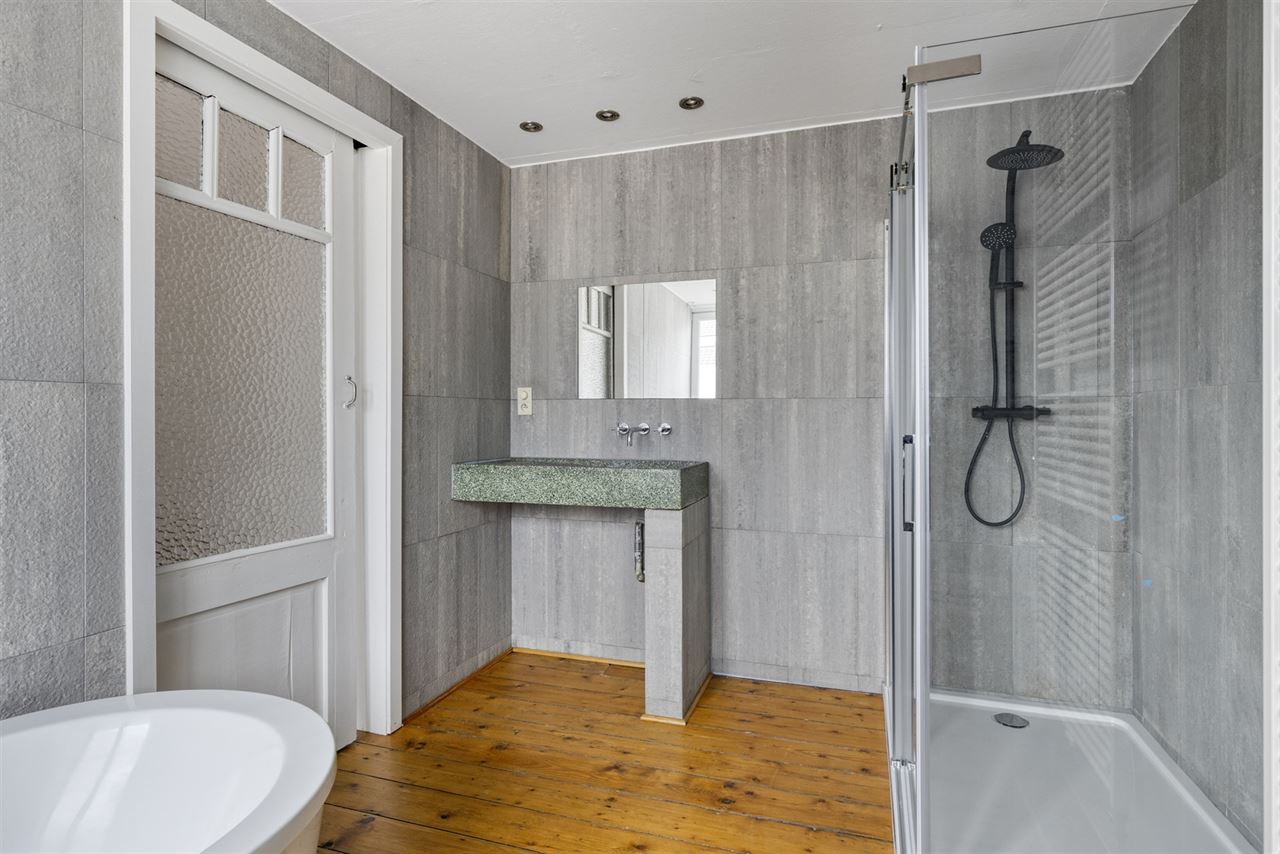 Herenwoning ingedeeld in 2 duplexappartementen