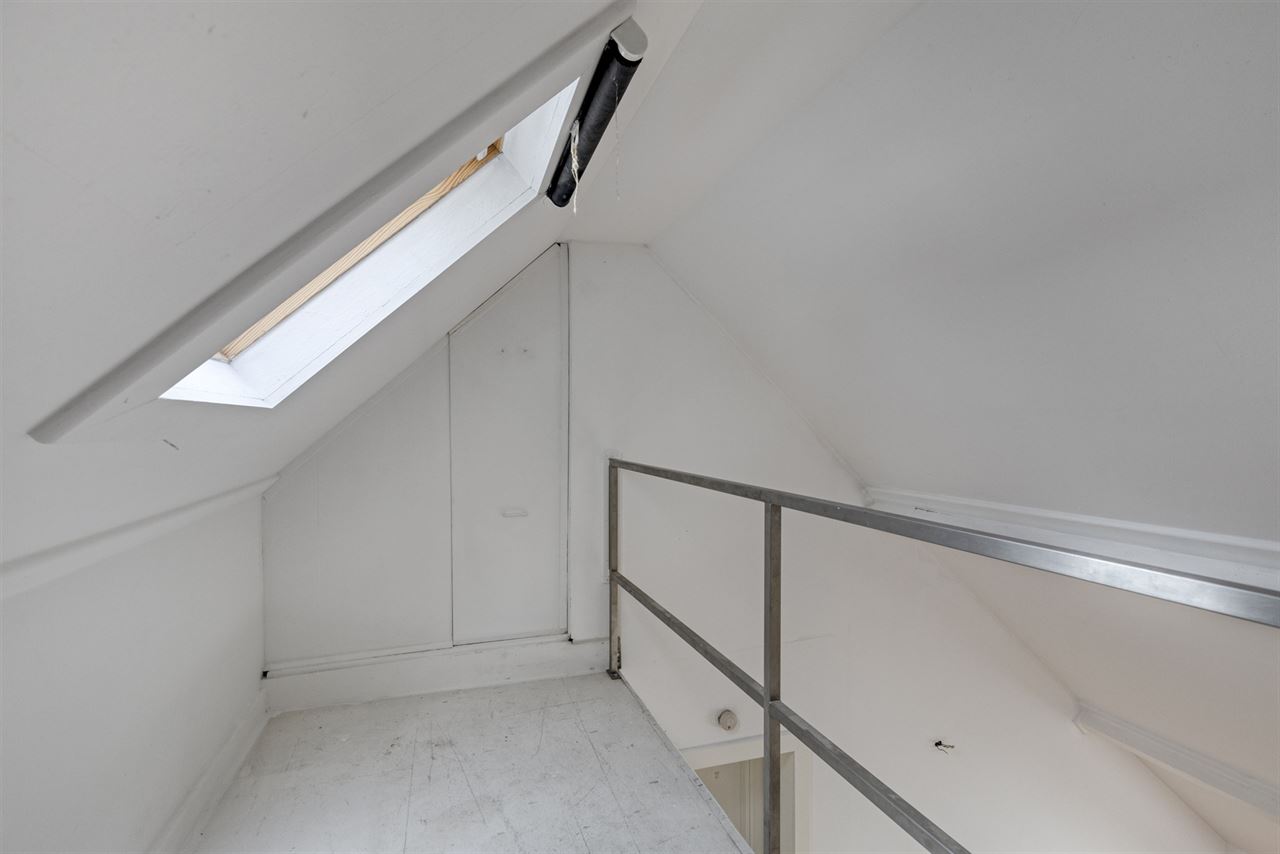 Herenwoning ingedeeld in 2 duplexappartementen