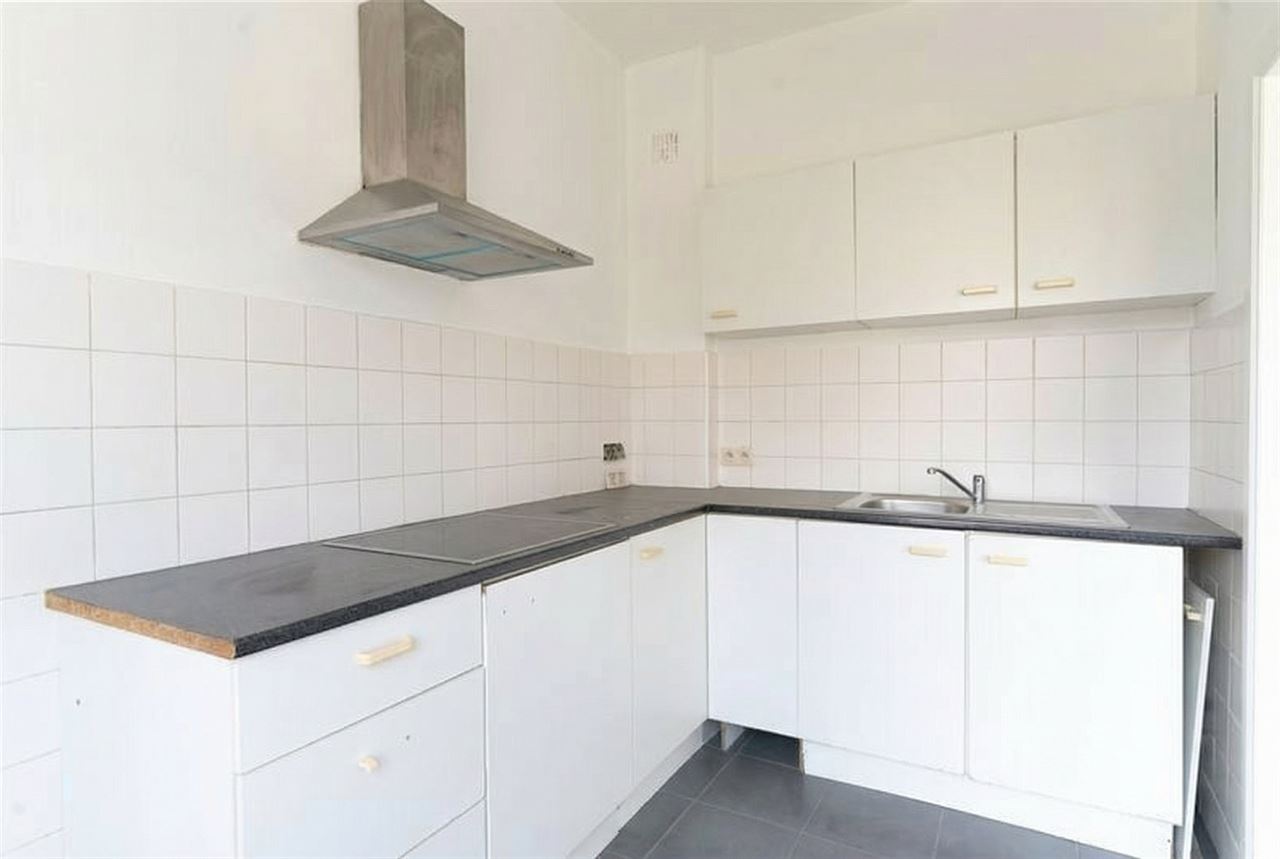 Lichtrijk appartement met 2 SLPK in een rustige straat!