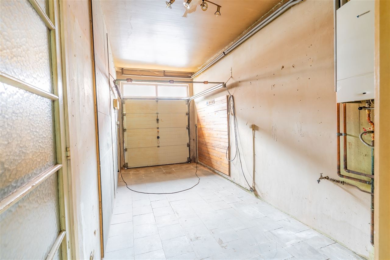 Gezinswoning met stadstuin & garage nabij Rivierenhof