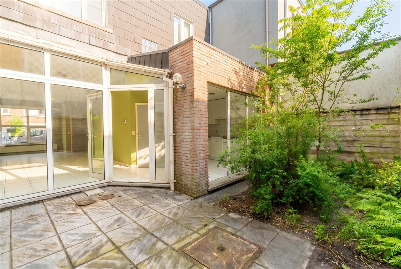Gezinswoning met stadstuin & garage nabij Rivierenhof
