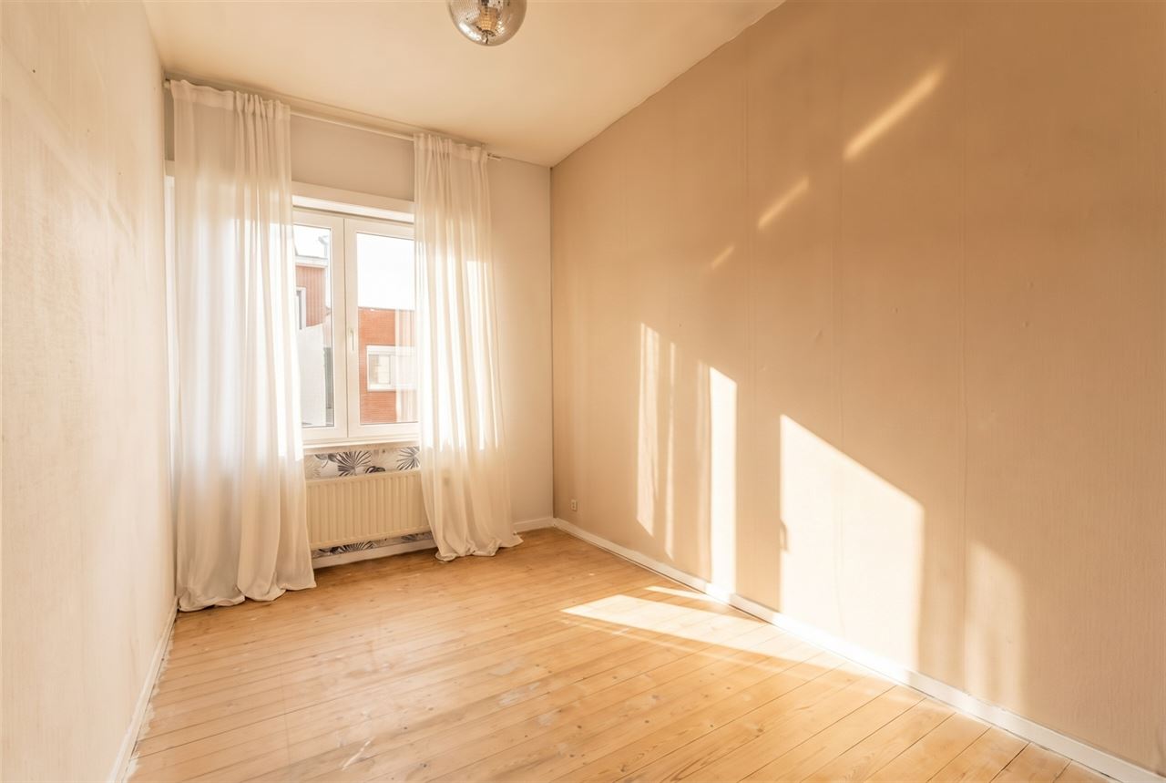 Gezinswoning met stadstuin & garage nabij Rivierenhof