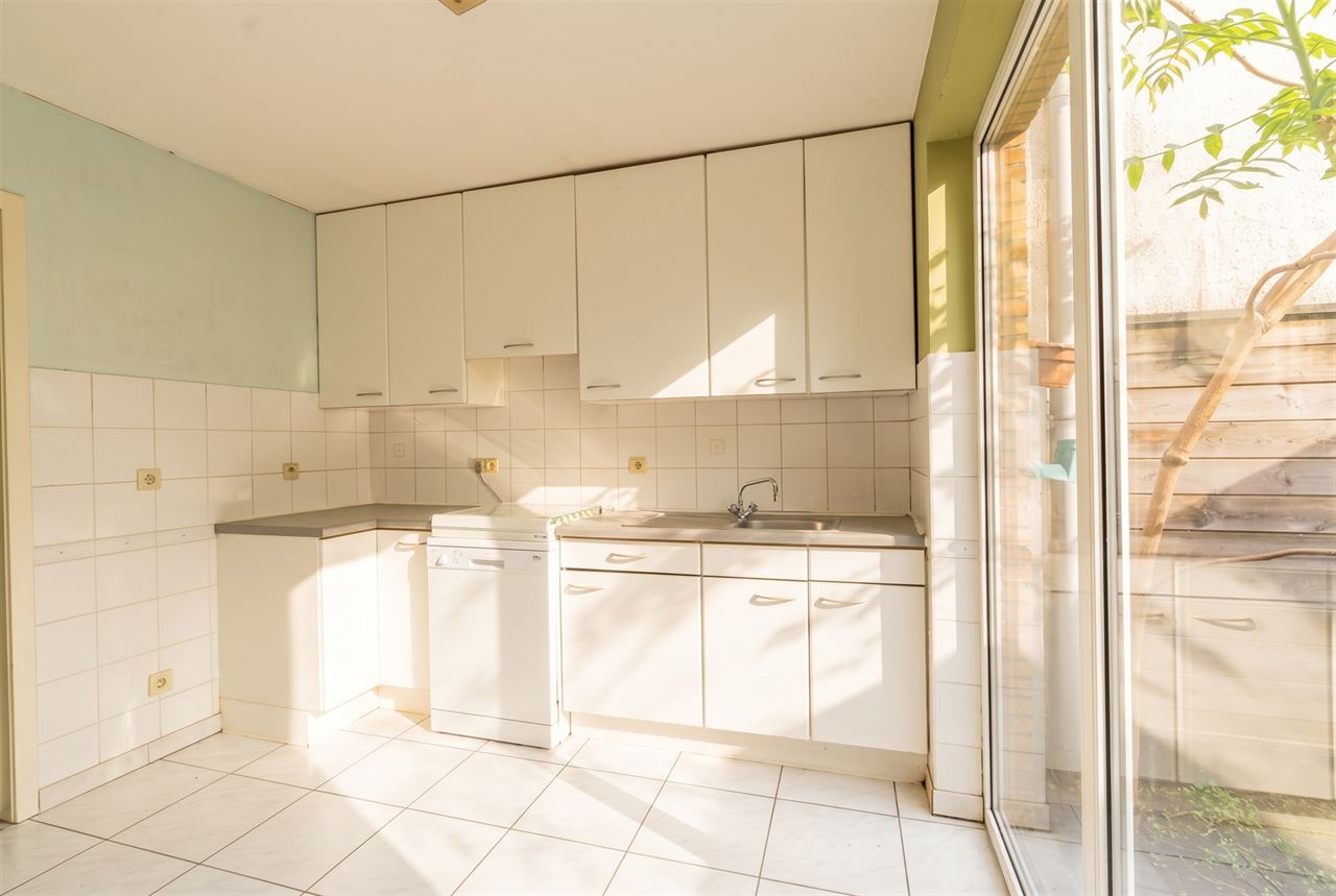 Gezinswoning met stadstuin & garage nabij Rivierenhof