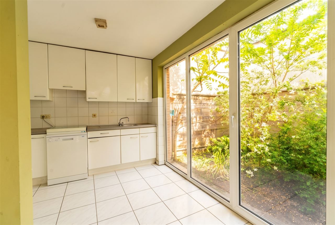 Gezinswoning met stadstuin & garage nabij Rivierenhof